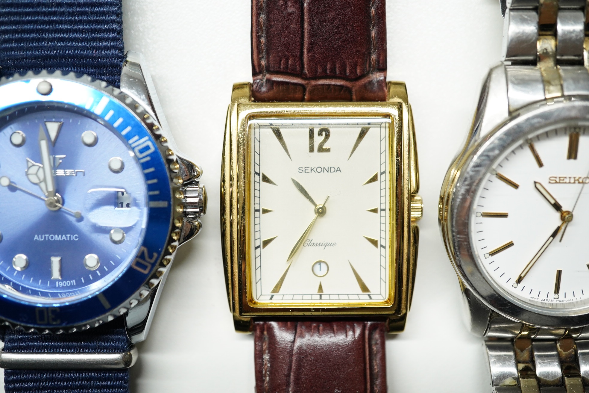 Four assorted gentleman's modern wrist watches, including Seiko, Sekonda and Rotary. Condition - fair to good